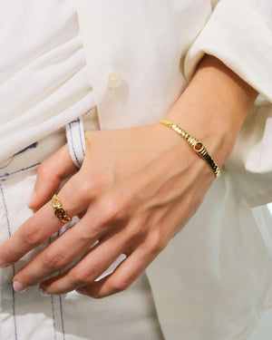 Thin Gold Ring, Striated Texture and Faceted Glass