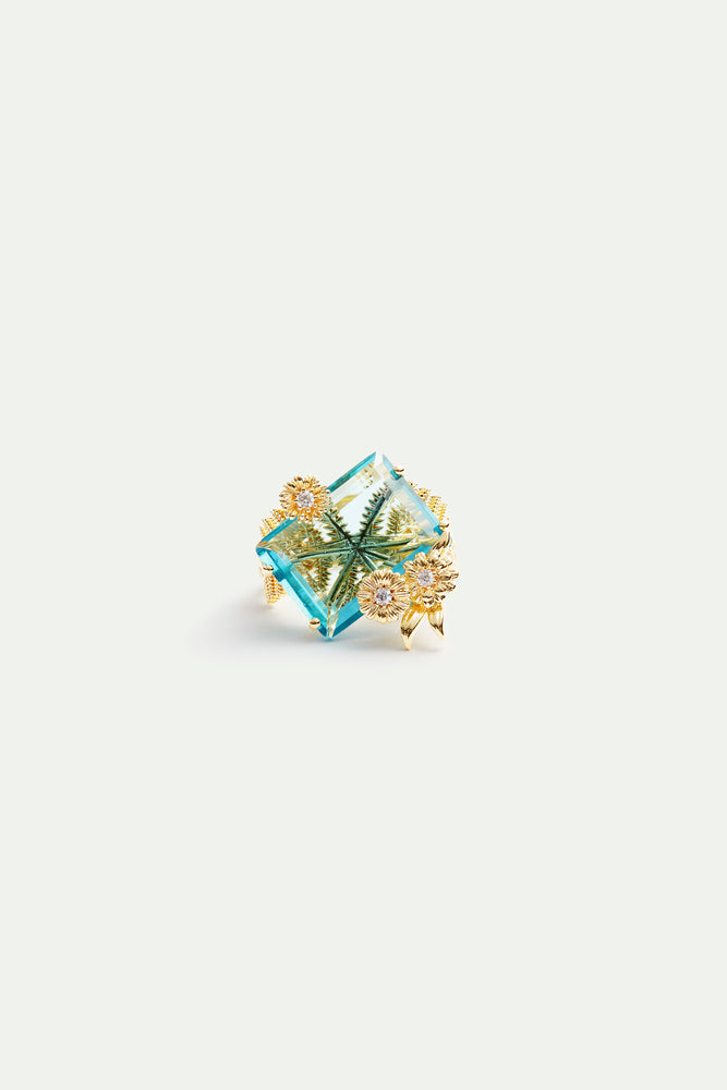 Blue Cut Stone and Golden Flower Ring