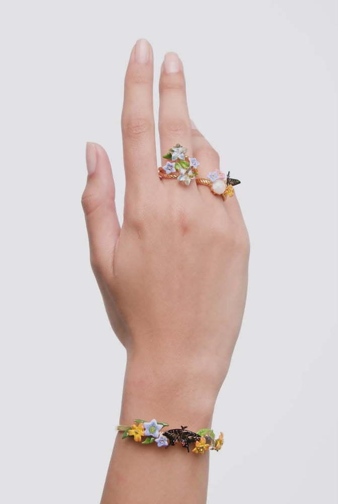 
            
                Load and play video in Gallery viewer, Faceted Star and Blue Jasmine Flower Adjustable You and Me Ring
            
        